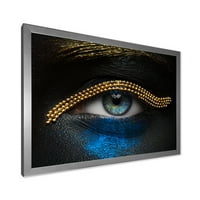 Designart 'Girl Eyes With Gold Chain and Blue Pigment' modern Framed Art Print